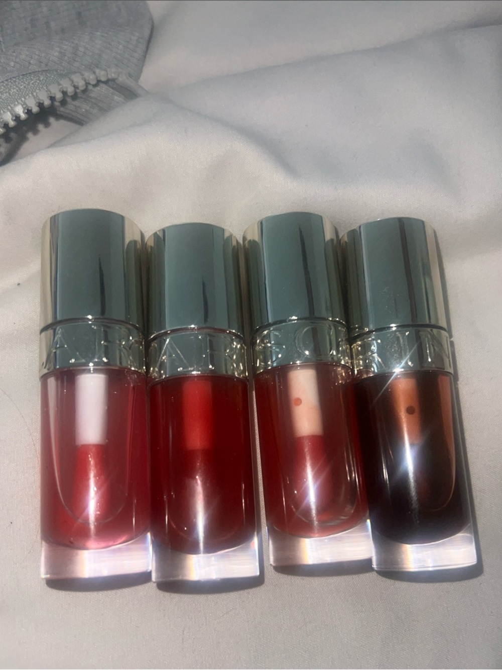 Clarins Lip Shine Set — Rose, Bright Red, Peachy Pink, Deep Berry